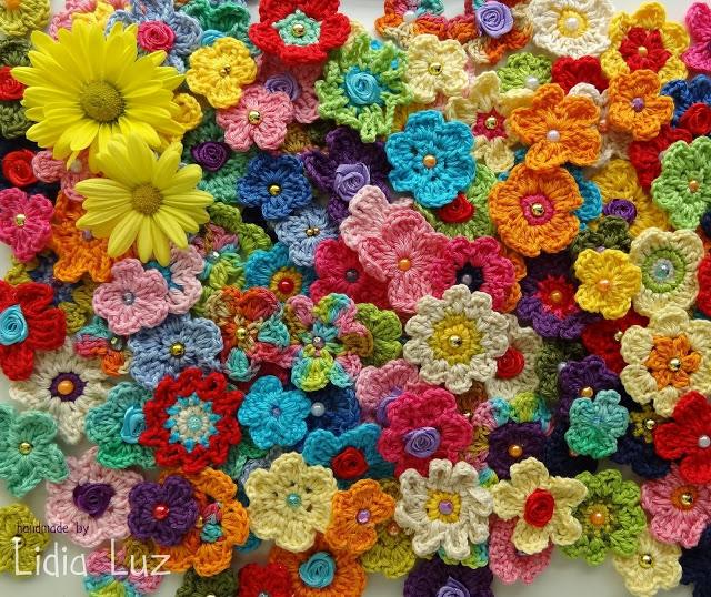 毛线钩花的各种花样图解 100款漂亮手工针织花(4)